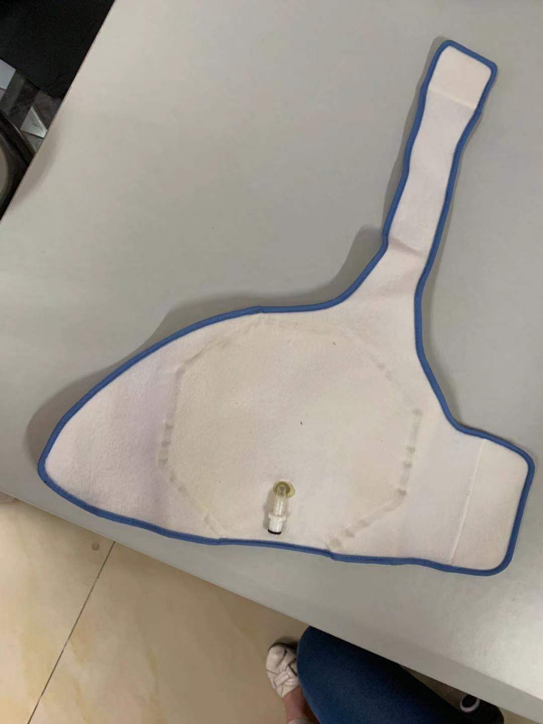 Negative pressure wound therapy pump, canister and dressing application photo